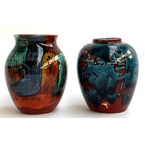 69 - Two Poole Pottery Volcano vases, 16.5cm and 15.5cm high (2)