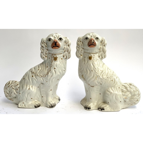 78 - A pair of Staffordshire dogs, highlighted in gilt, each 31cmH, one AF