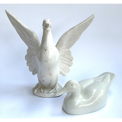 82 - An Italian white glazed ceramic duck, marked 'Flo' to base, 41.5cmH; together with one other