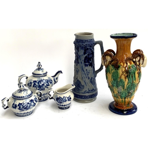 98 - A three piece Gzhel Russian tea set; a majolica style vase with twin rams head handles, 33cmH; and a... 