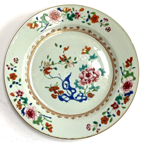 115 - A Chinese famille rose plate with chrysanthemum decoration, heightened in gilt, 23cmD