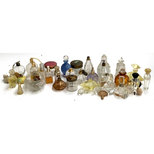 131 - A collection of scent bottles, some art deco, to include Dior, Peter Tysoe Glass, etc