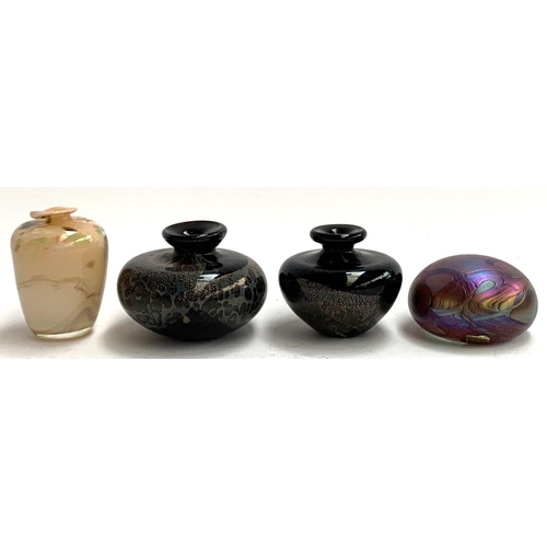 132 - An Isle of Wight iridescent glass paperweight, 7.5cmD; two art glass vases; and one other, signed in... 