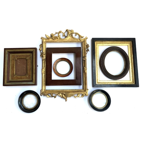 284 - A lot of eight various picture frames, including a pair of 19th century circular ebonised frames, ea... 