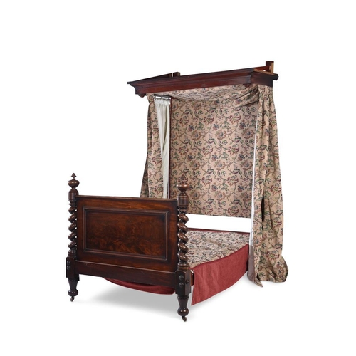 912 - A mahogany half tester bed in Victorian style comprising some period elements the canopy above the u... 