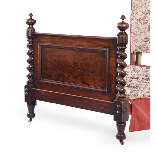 912 - A mahogany half tester bed in Victorian style comprising some period elements the canopy above the u... 