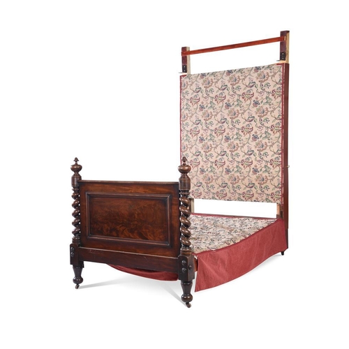 912 - A mahogany half tester bed in Victorian style comprising some period elements the canopy above the u... 