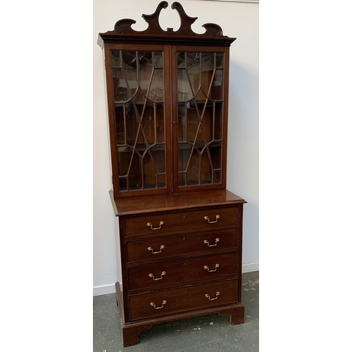 925 - A 20th century mahogany glazed bookcase on a chest of four graduating drawers and bracket feet, 73cm... 