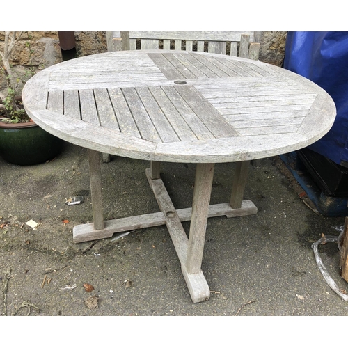 941 - A slatted teak garden table, 120x76cmH