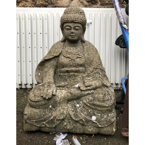 951 - A composite stone figure of a seated Buddha, 65cmH