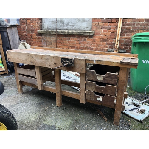 954 - A wooden workbench with record vice and drawers, 193x53x80cmH