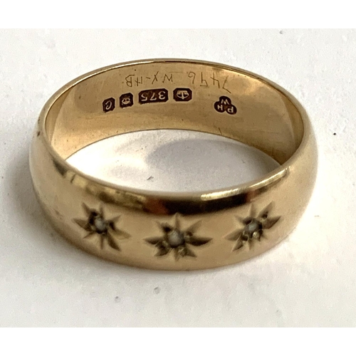 1 - A 9ct gold gypsy ring set with three small diamonds with engraved star detail, approx. 3.3g, size L ... 