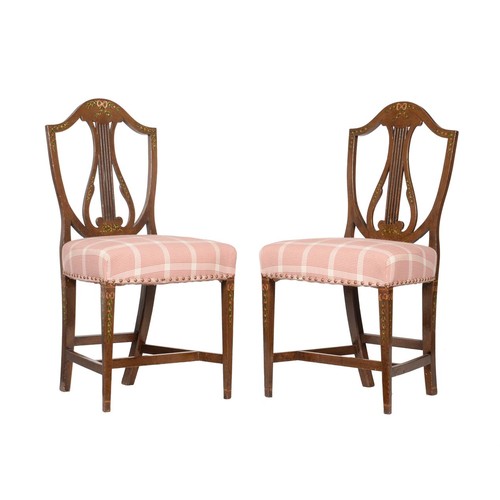 677 - A pair of polychrome painted mahogany side chairs, in George III style, c.1900, each with a lyre spl... 