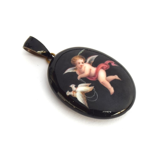 28 - A 19th century enamel and gilt metal locket decorated with a hand painted cupid holding doves on str... 