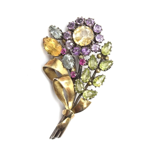 1 - Attributed to Dorrie Nossiter, a c.1930 Arts and Crafts gem set floral brooch, set with citrines, am... 