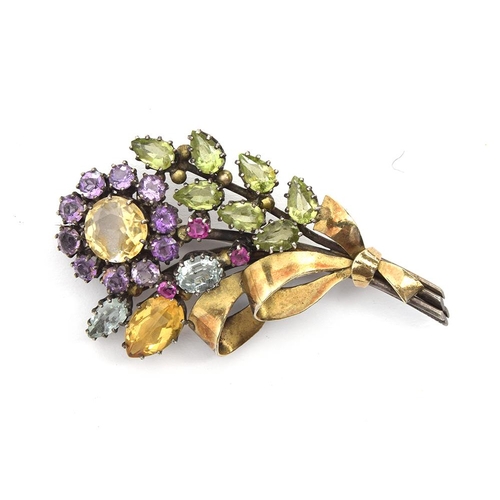 1 - Attributed to Dorrie Nossiter, a c.1930 Arts and Crafts gem set floral brooch, set with citrines, am... 