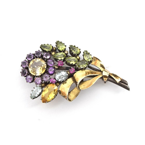 1 - Attributed to Dorrie Nossiter, a c.1930 Arts and Crafts gem set floral brooch, set with citrines, am... 