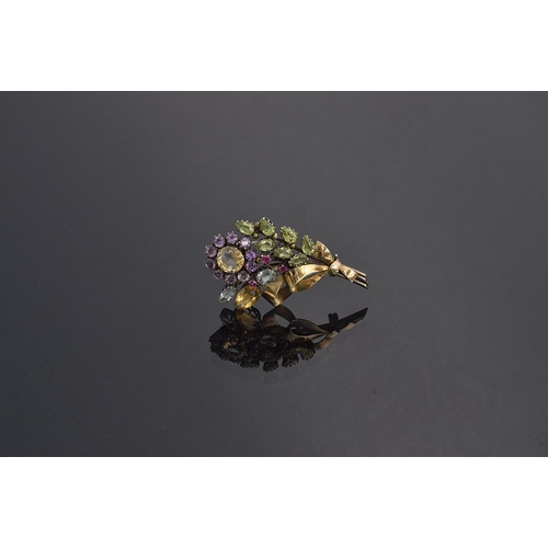 1 - Attributed to Dorrie Nossiter, a c.1930 Arts and Crafts gem set floral brooch, set with citrines, am... 