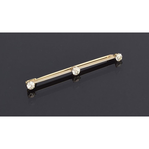 2 - An early 20th century gold and old brilliant cut diamond set knife edge bar brooch, tests as at leas... 