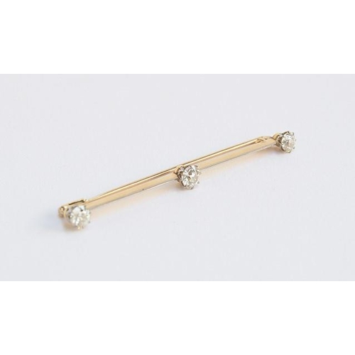 2 - An early 20th century gold and old brilliant cut diamond set knife edge bar brooch, tests as at leas... 