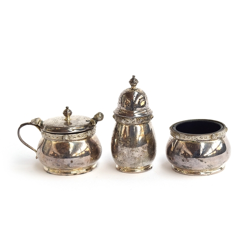 93 - A three piece silver cruet set by Adie Brothers Ltd, Birmingham 1960, with Celtic band decoration, t... 