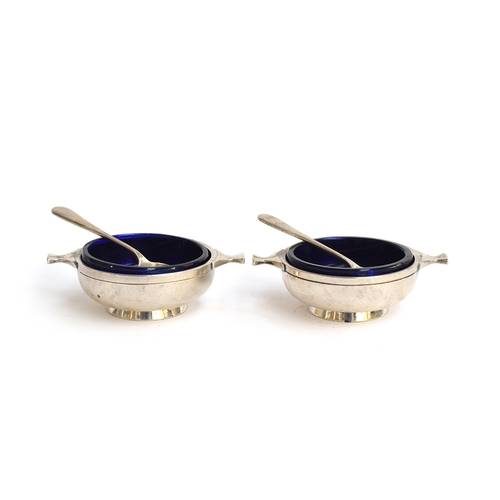 94 - A pair of salts by the Adie Brothers Ltd, Birmingham 1924, in the form of twin handled porringers, e... 