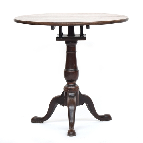 588 - A George III mahogany circular tripod table, top top birdcage action, on turned column and cabriole ... 