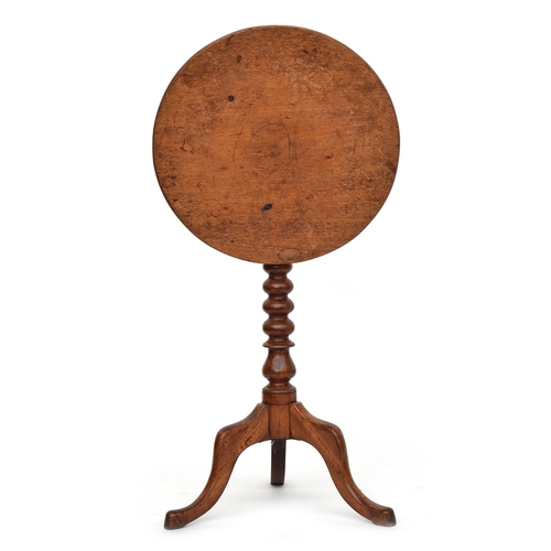 590 - A small circular tripod table, tip-top on bobbin turned column on cabriole legs, 44cm diameter, 68cm... 