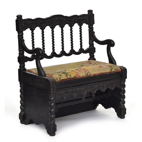 714 - A set of Victorian ebonized metamorphic library steps, in the form of a miniature settle which close... 