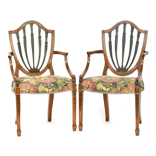 676 - A pair of parcel painted beech Hepplewhite revival shield back open armchairs, stuffover seats on sq... 