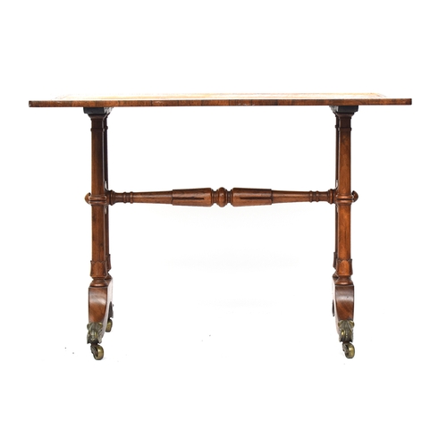 631 - A Regency rosewood centre table, with gilt tooled leather skiver, on four turned tapering supports w... 