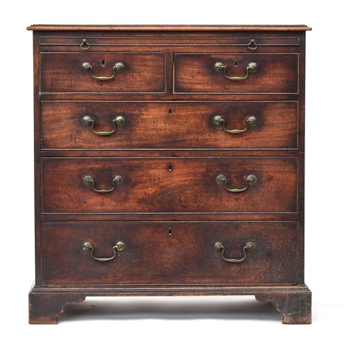 574 - A George III mahogany bachelors chest, crossbanded moulded top over a slide, with two short over thr... 