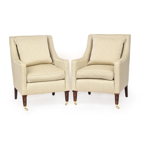 708 - A pair of George Smith armchairs upholstered in stone silk, on turned mahogany tapered legs with bra... 