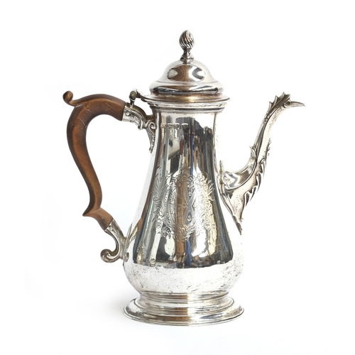 106 - An early George III silver coffee pot, maker's mark rubbed, London 1764, baluster form, the hinged c... 