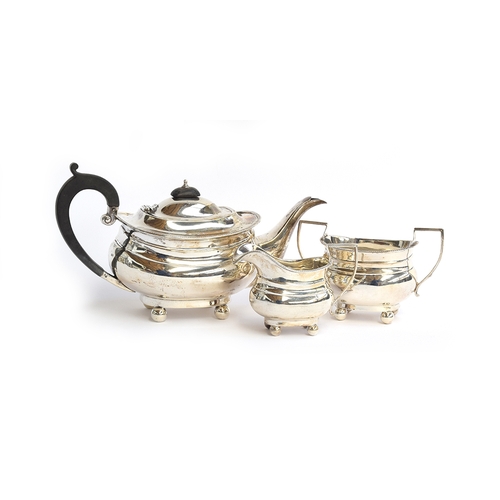 103 - A George V three piece silver tea set by Henry Williamson Ltd, Birmingham 1923, of ovoid for, raised... 