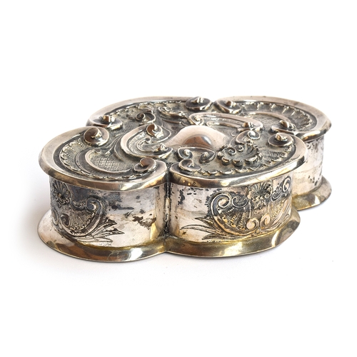 109 - A Portuguese 833 silver jewellery box, lobed form chased in rococo taste, with a padded silk lined i... 