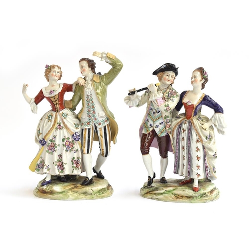 207 - Two Dresden porcelain figurines of dancing couples, the taller 22cm high