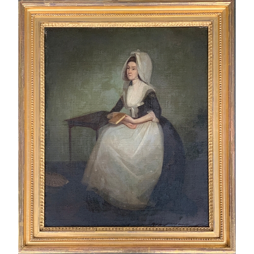 372 - A 19th century full length portrait of a solemn lady holding a book, oil on canvas, 47x58cm