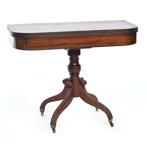 604 - A William IV mahogany tea table, c.1830, foldover top on turned column, hipped and reeded supports o... 