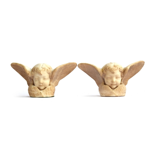 164 - A pair of Italian carved Carrara marble cherub wall sculptures/sconces, 35cm wide, 17.5cm high

Prov... 