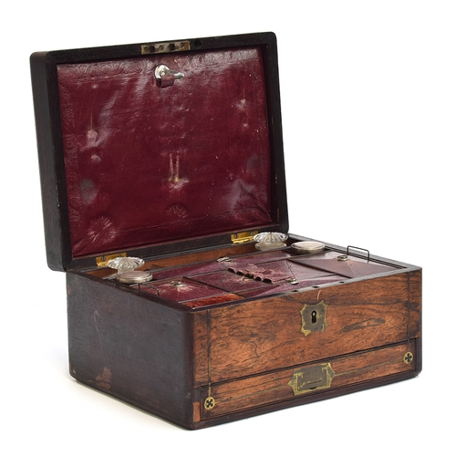 160 - A 19th century rosewood and brass inlaid vanity set with burgundy leather interior, the case contain... 