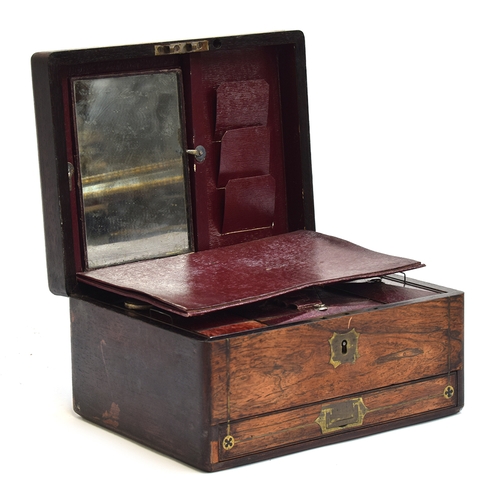 160 - A 19th century rosewood and brass inlaid vanity set with burgundy leather interior, the case contain... 