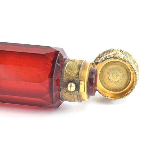 140 - A 19th century Morden & Co. double ended scent and smelling salts bottle, faceted ruby glass, with s... 