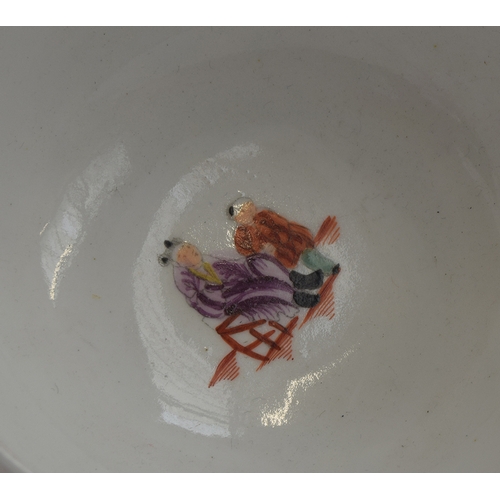 227 - An 18th century Newhall teacup and saucer, 'Boy and the Butterfly' pattern, the cup 10cm diameter, t... 