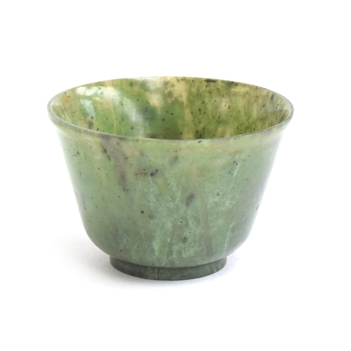 176 - A Chinese spinach jade cup, of flaring form with short form foot, approx. 6cm diameter, 4cm high