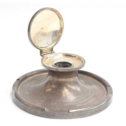 128 - A large silver capstan inkwell, with clear glass liner, Birmingham 1922, 17.5cm diameter