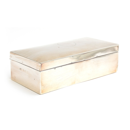 126 - An early 20th century silver cigarette box by Joseph Gloster Ltd, Birmingham, of rectangular form wi... 