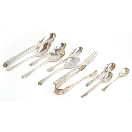 67 - A small lot of silver flatware, to include an 18th century Scottish teaspoon, sugar tongs, etc, 6.1o... 