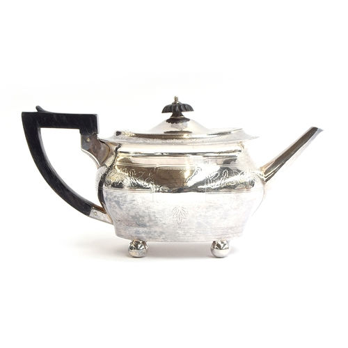 105 - A Victorian silver teapot by William & Henry Stratford, Sheffield 1878, ovoid body with bright cut d... 