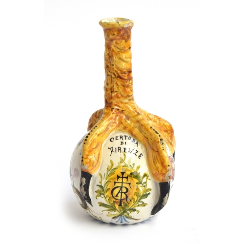 246 - An Italian Majolica Certosa di Firenze monastic pilgrim's flask, in the form of a claw grasping an o... 